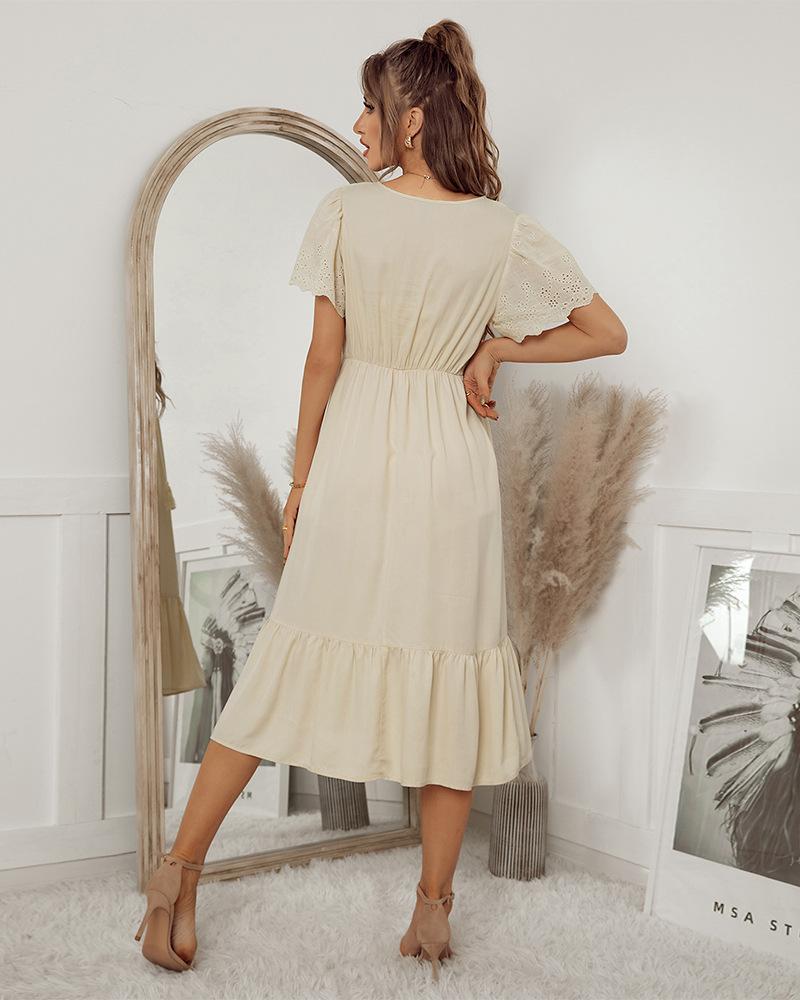 Vestido con borlas y detalle de ojales