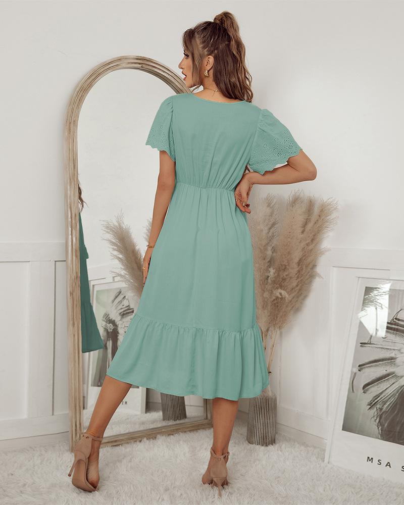 Vestido con borlas y detalle de ojales