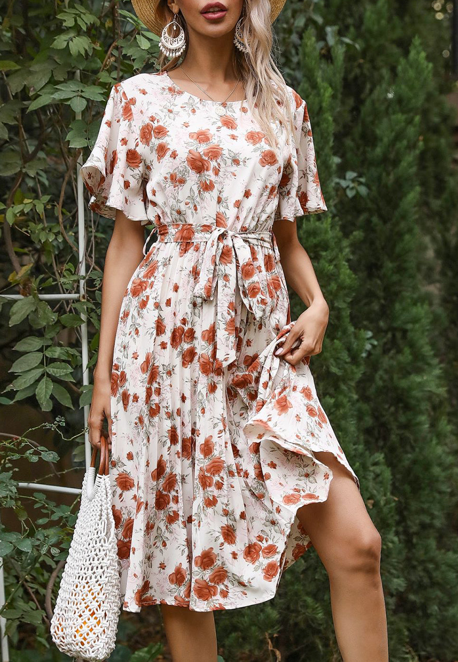 Vestido plisado con flores y cuello redondo