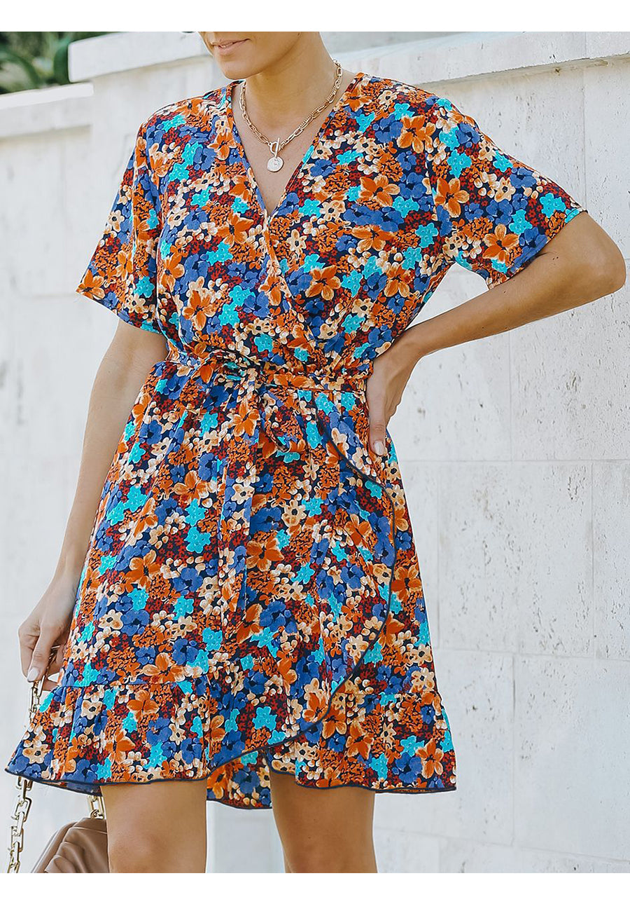 Vestido floral con dobladillo con volantes cruzados