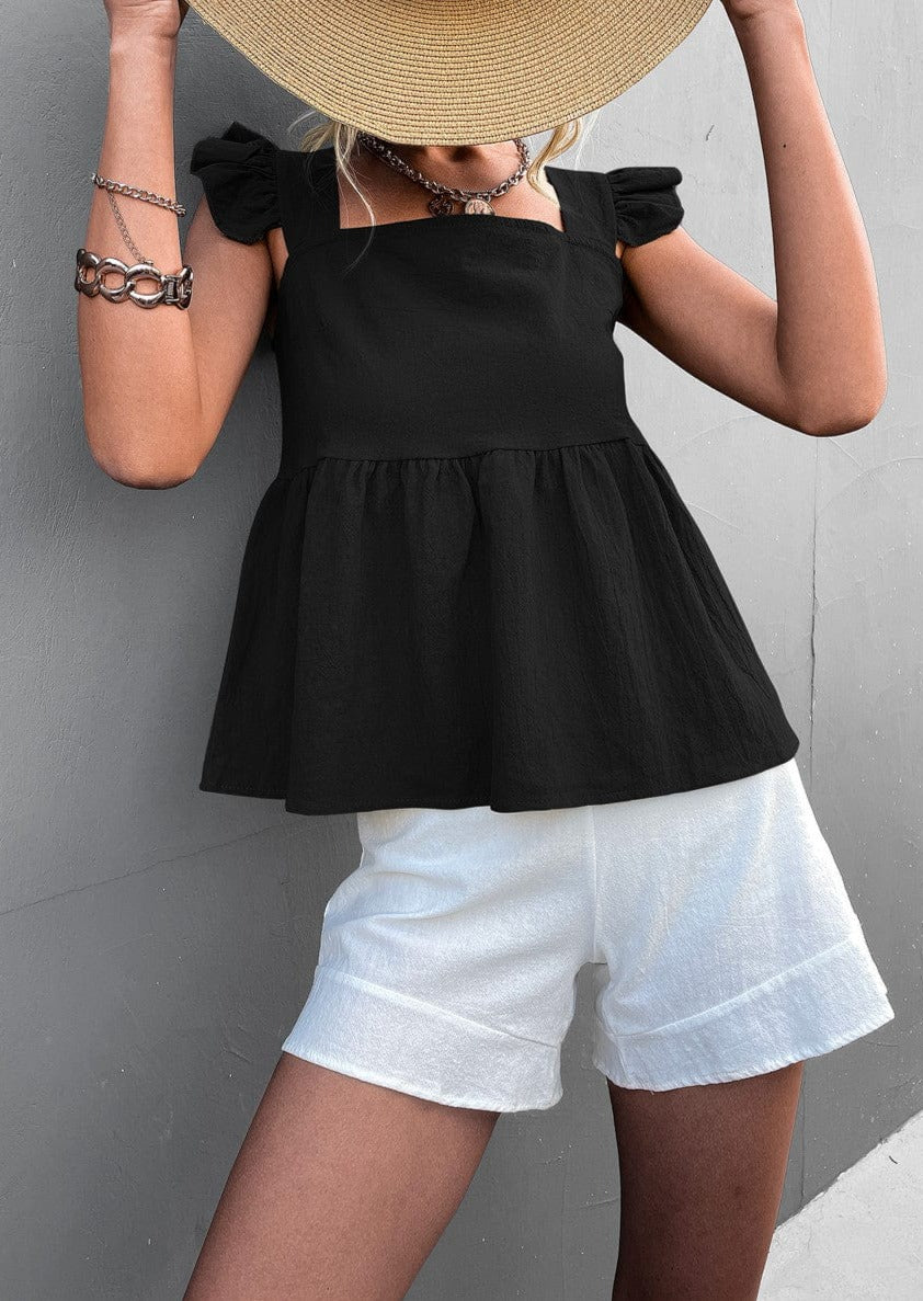 Blusa ligera con peplum y volantes