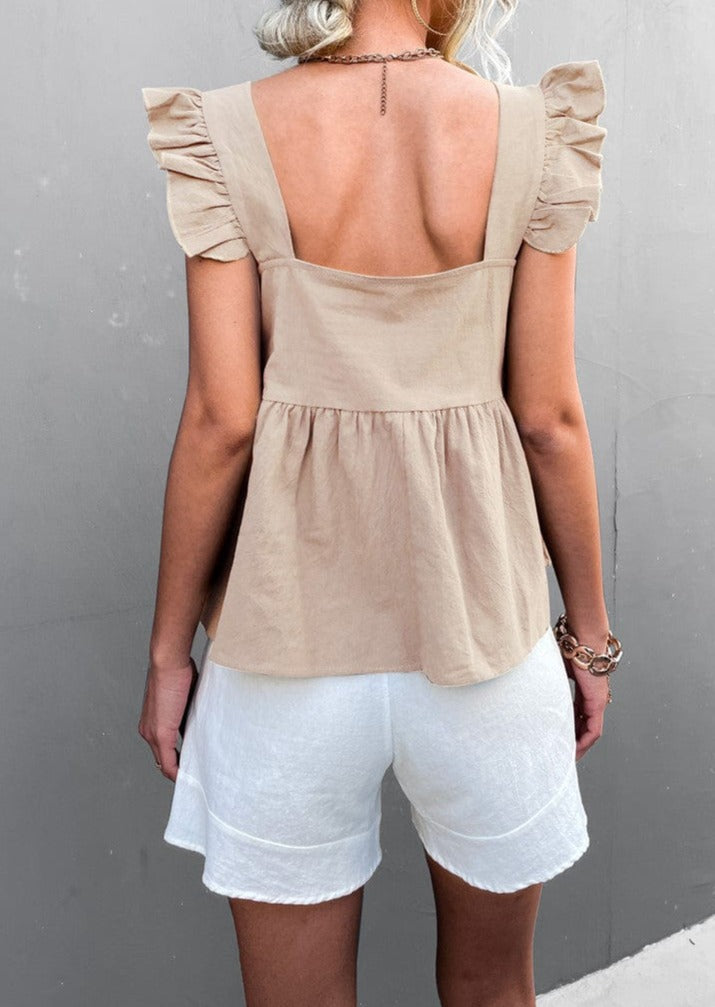 Blusa ligera con peplum y volantes