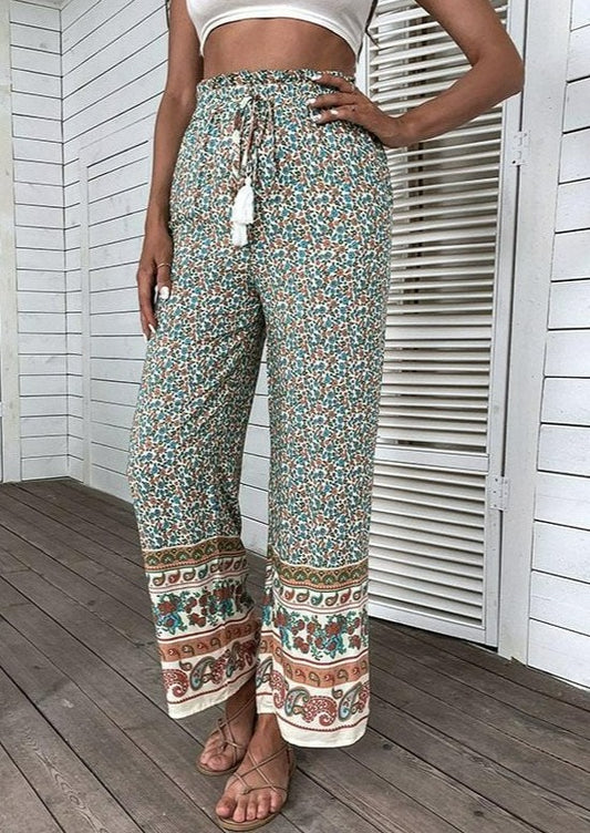 Pantalones bohemios con lazo y borlas
