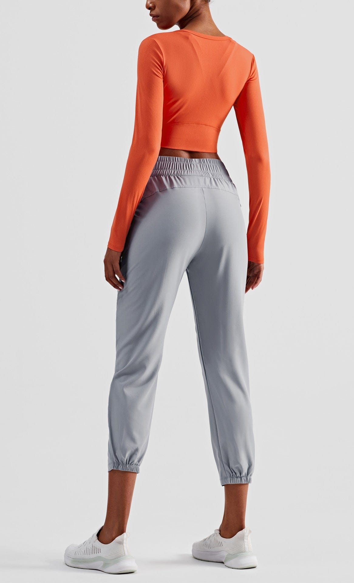 Top de manga larga con escote en V y corte recortado