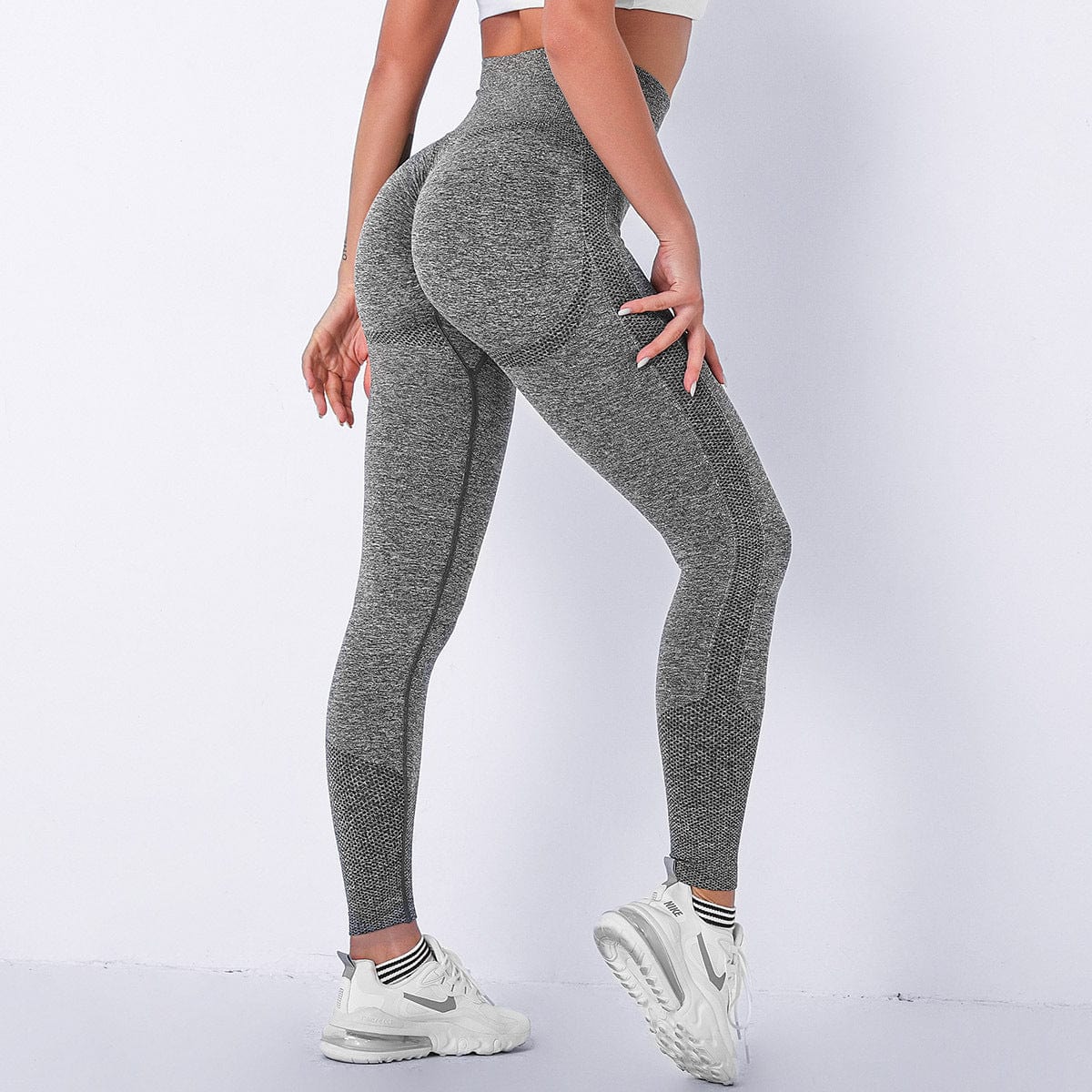Leggings de tiro alto que modelan los glúteos