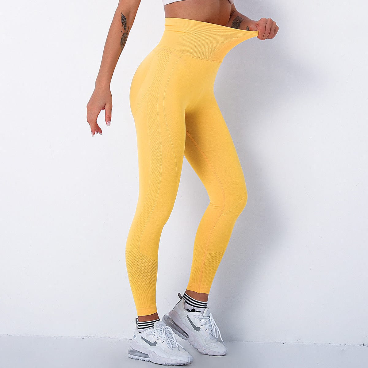 Leggings de tiro alto que modelan los glúteos