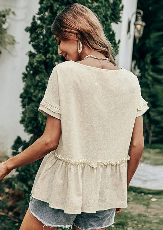 Blusa peplum con volantes texturizados