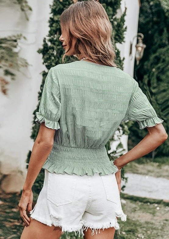 Blusa texturizada con cintura fruncida