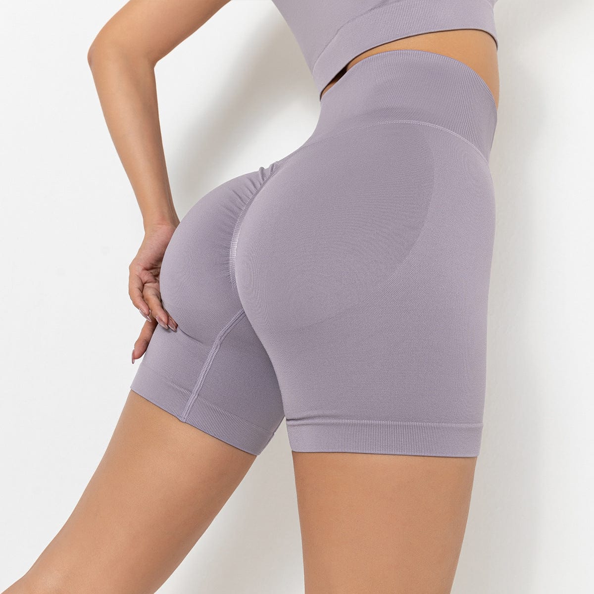 Pantalones cortos de ciclista moldeadores de tiro alto y canalé