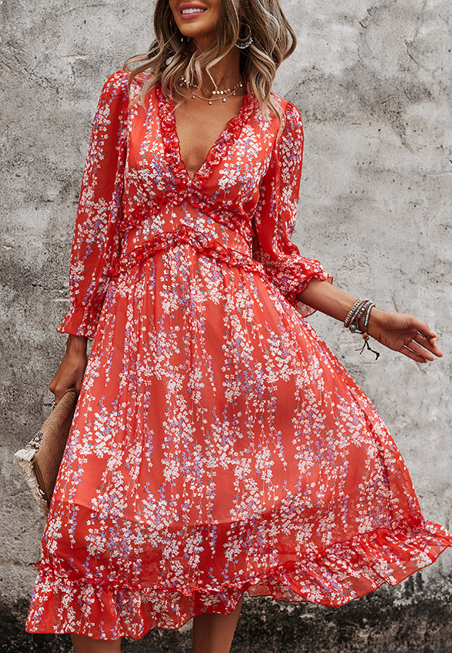 Vestido con escote pronunciado y detalle de volante