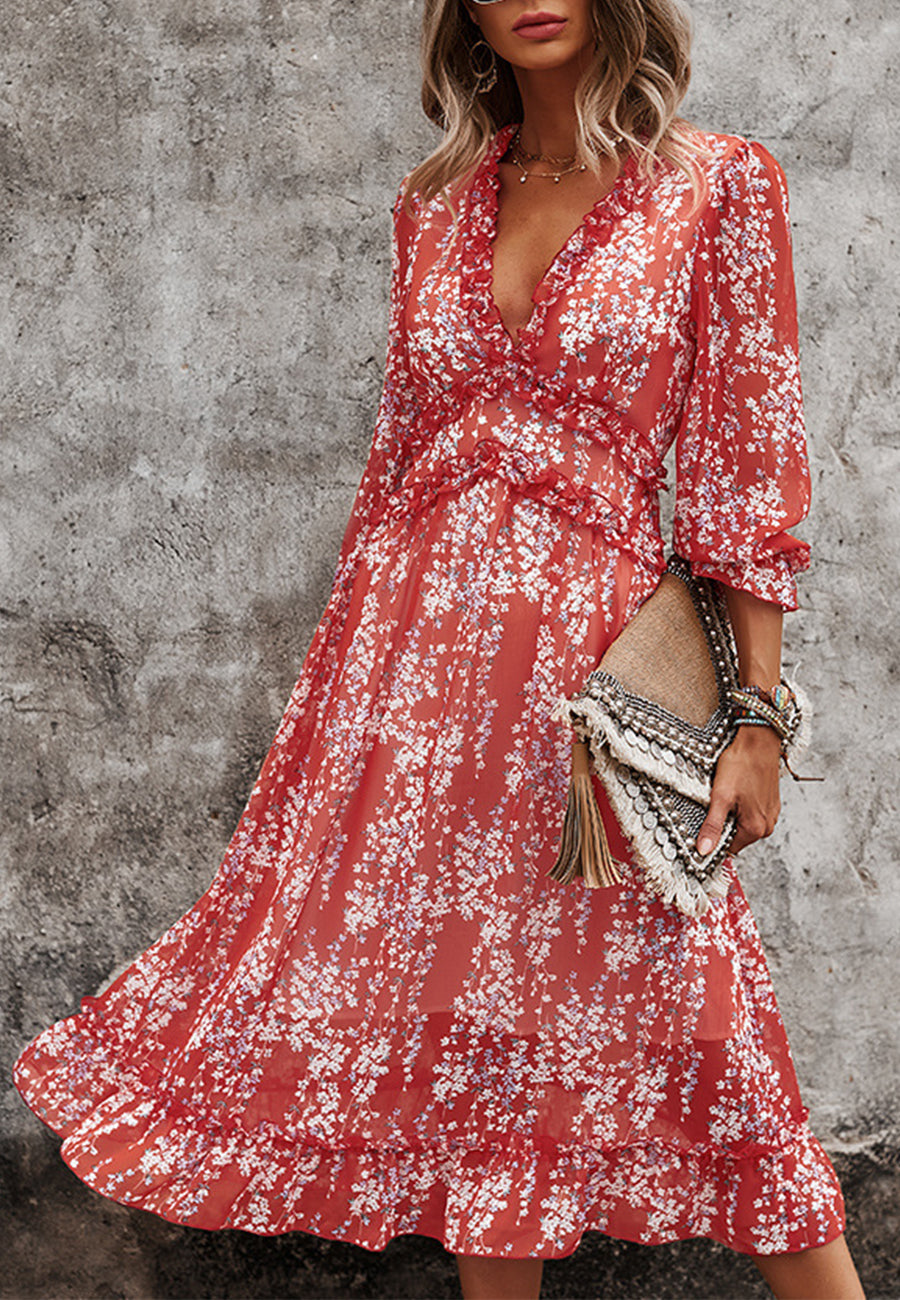 Vestido con escote pronunciado y detalle de volante
