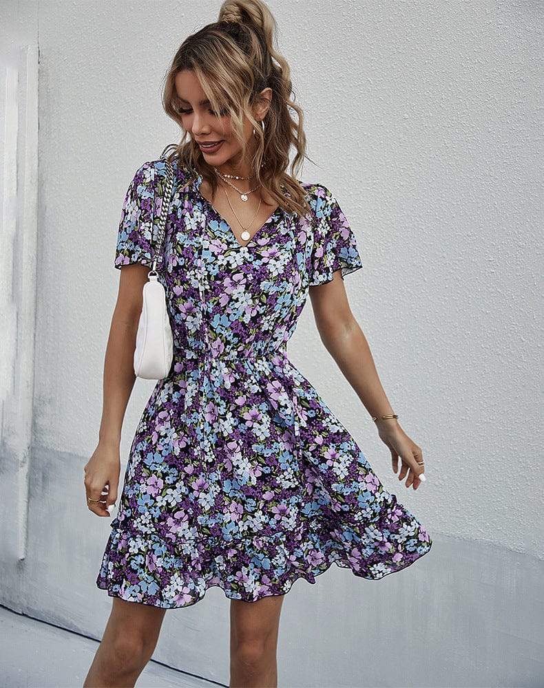Vestido con cuello anudado y mangas abullonadas