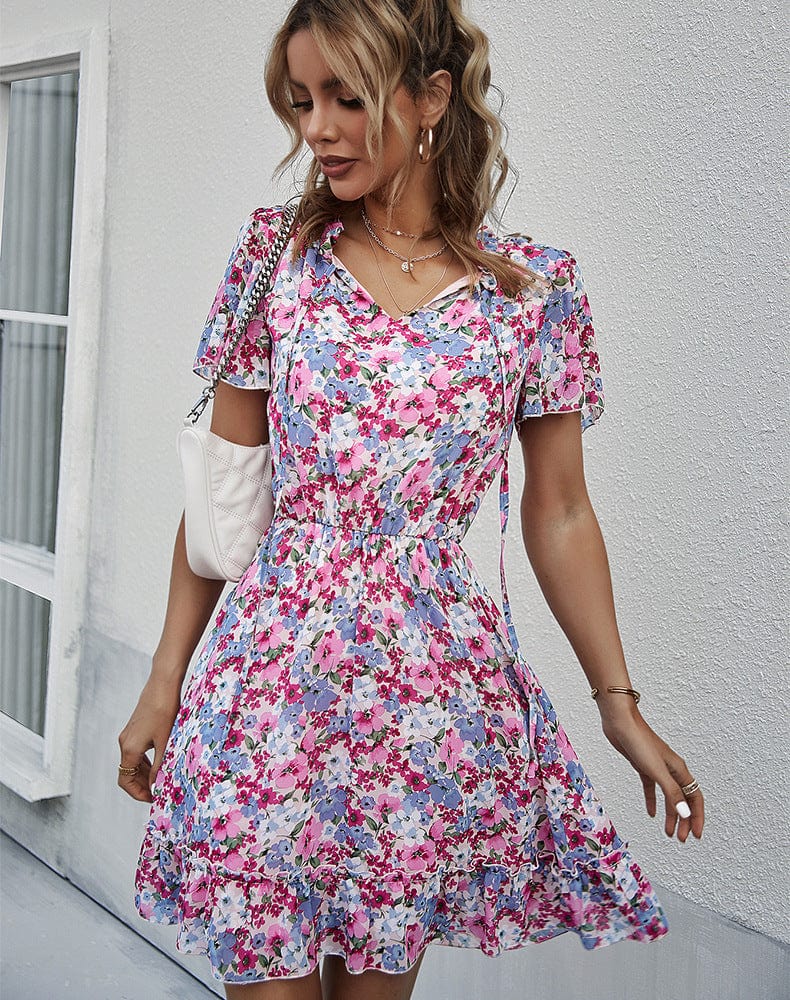Vestido con cuello anudado y mangas abullonadas