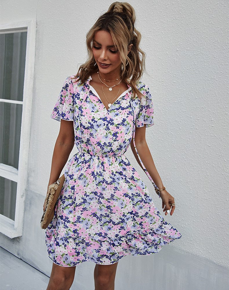 Vestido con cuello anudado y mangas abullonadas