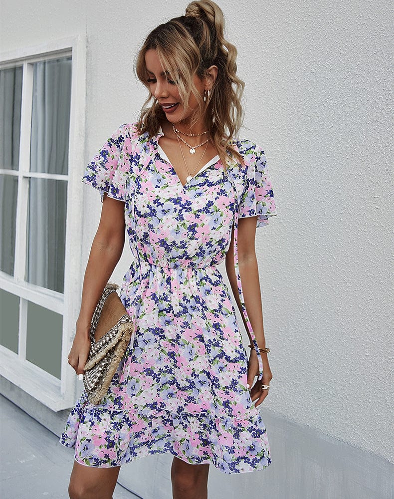 Vestido con cuello anudado y mangas abullonadas