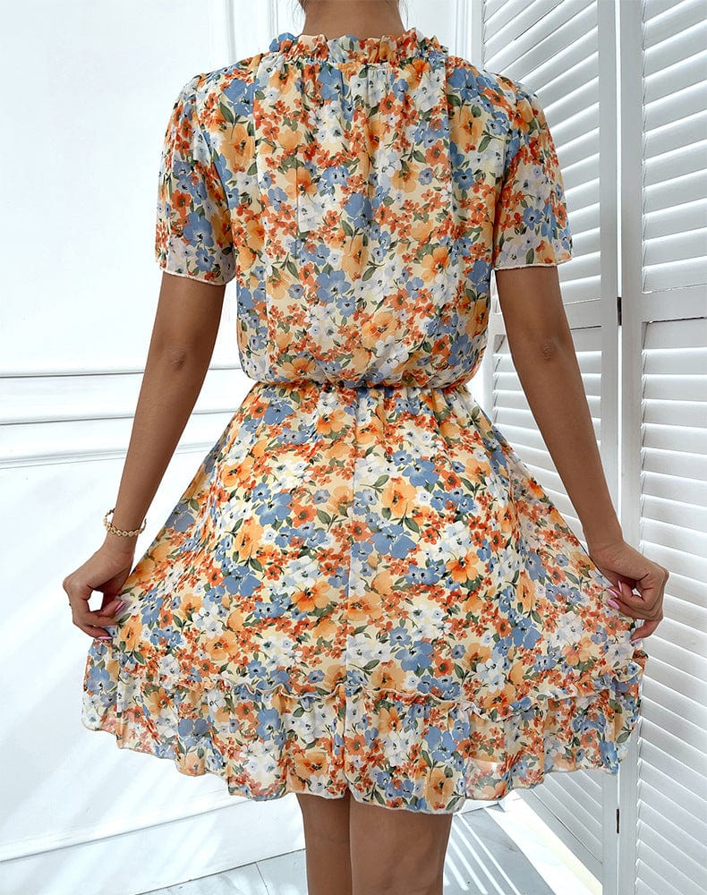 Vestido con cuello anudado y mangas abullonadas