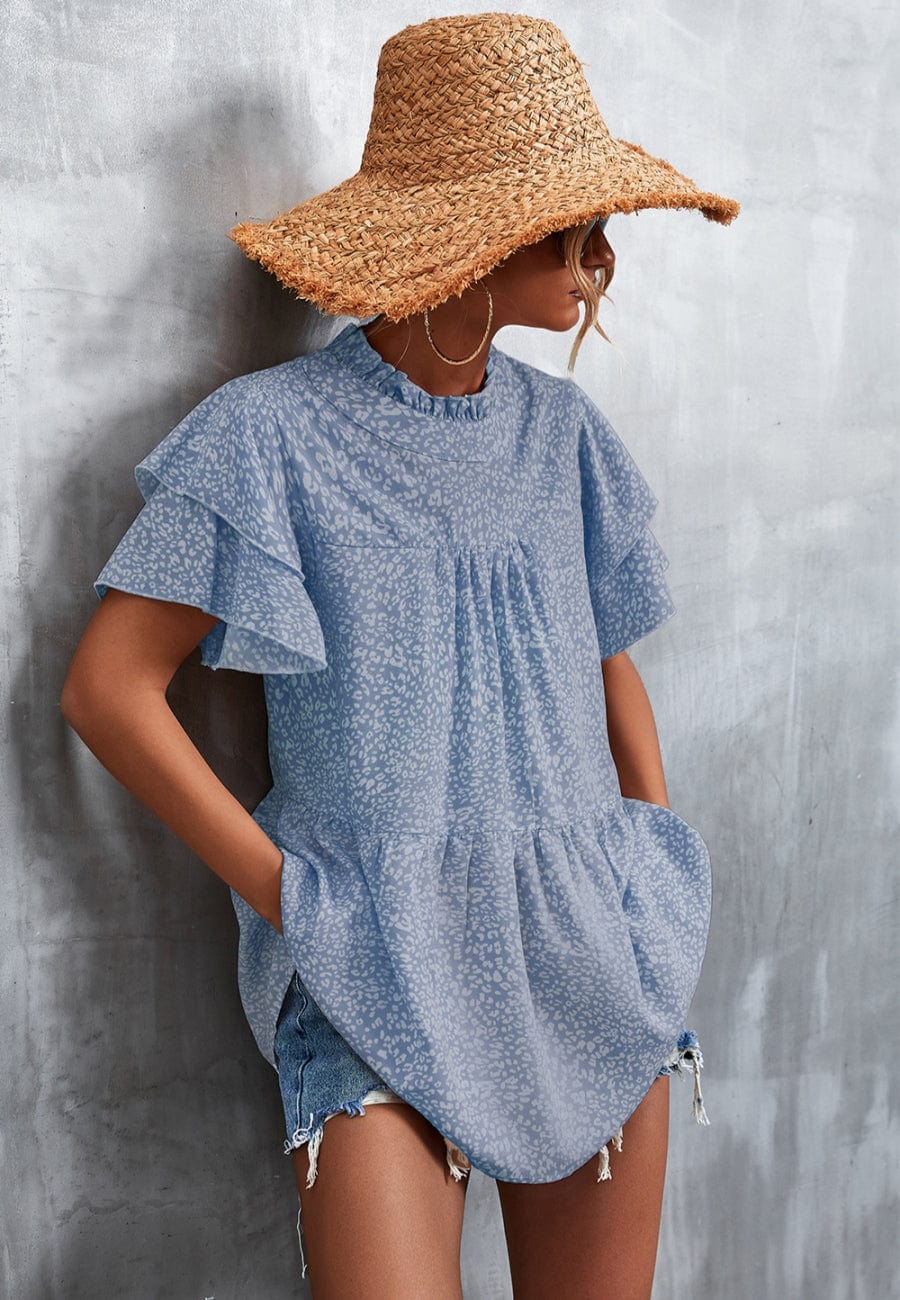 Blusa ligera con volados en el cuello