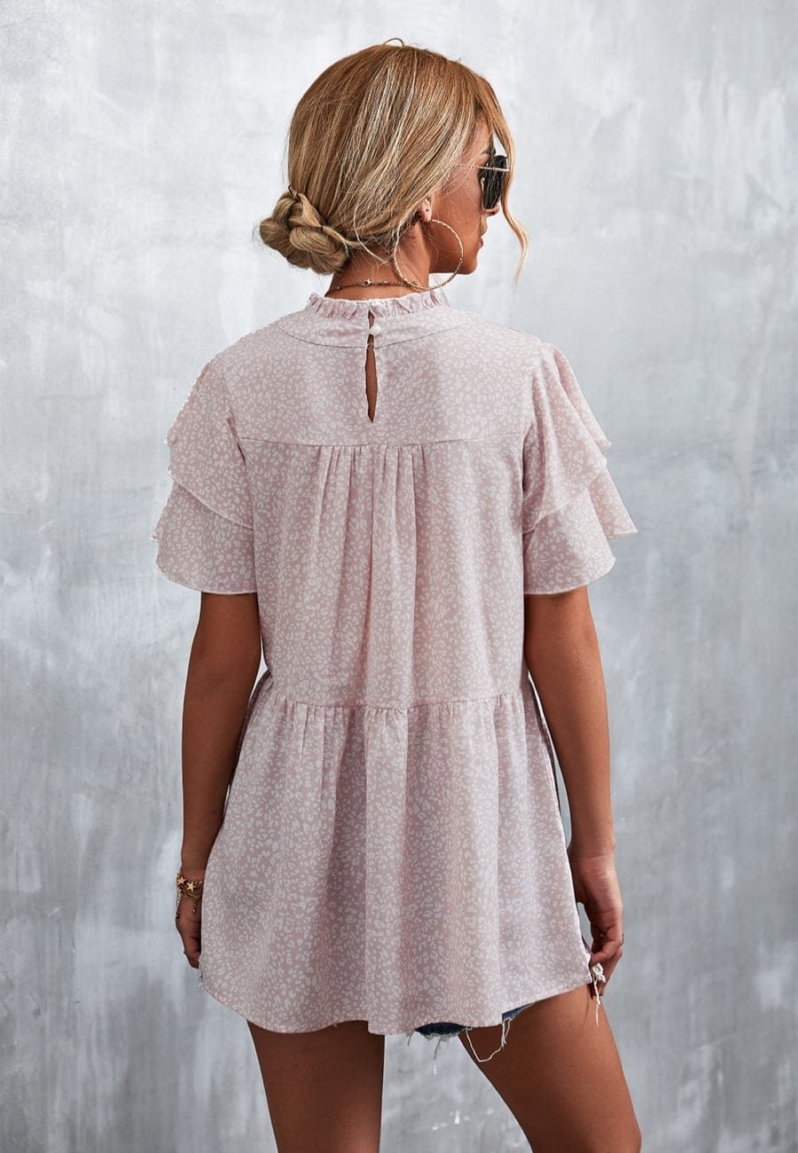 Blusa ligera con volados en el cuello