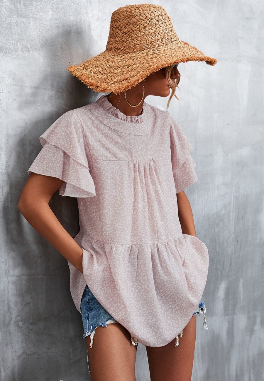 Blusa ligera con volados en el cuello