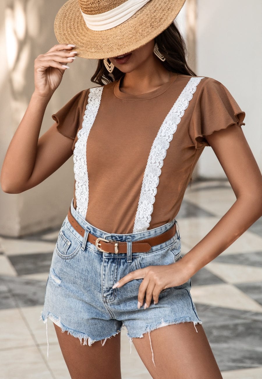Blusa con mangas abullonadas y ribete de encaje