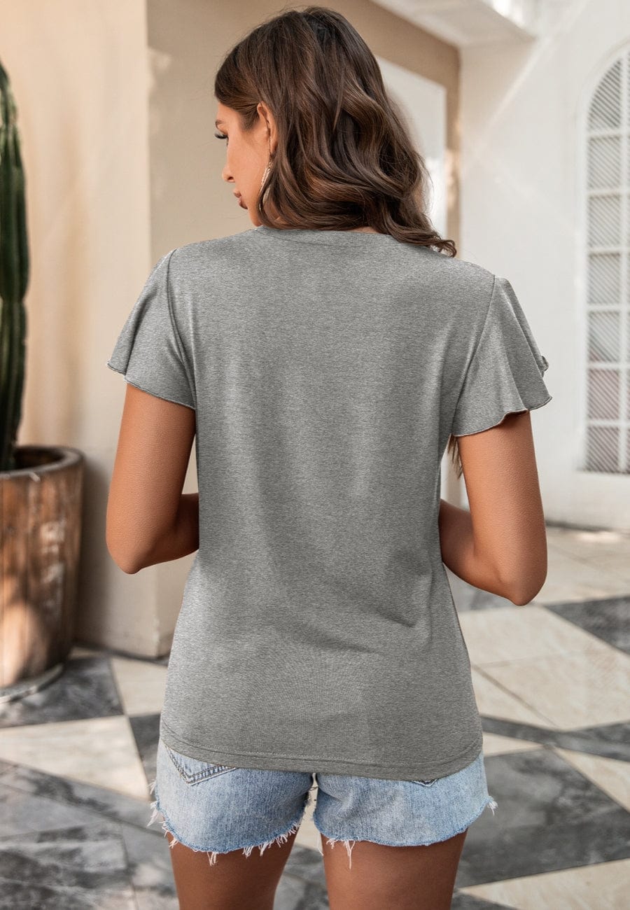 Blusa con mangas abullonadas y ribete de encaje