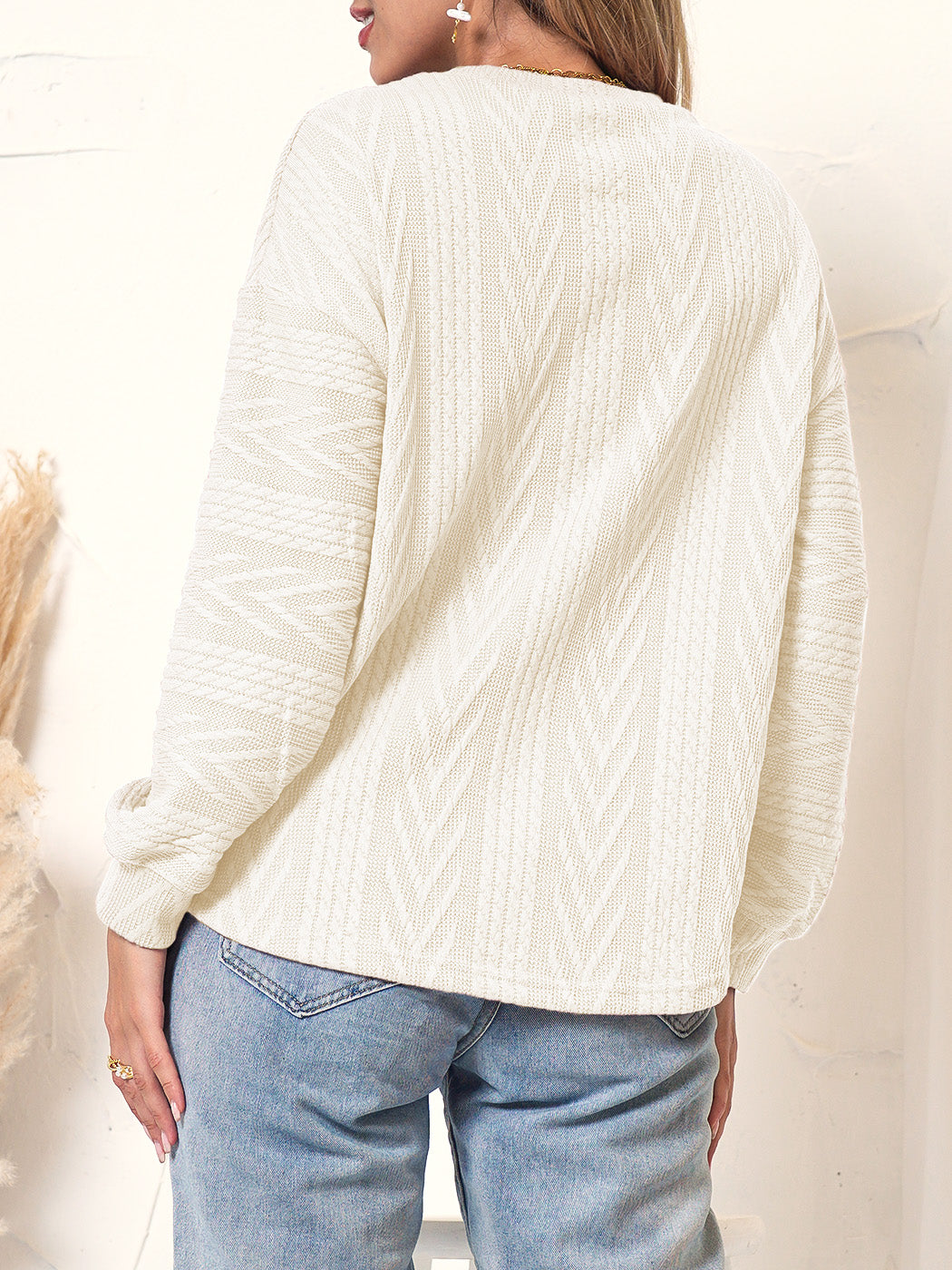 Suéter de punto texturizado con hombros caídos