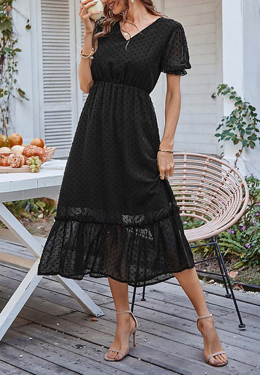Vestido con dobladillo con volantes y lunares suizos