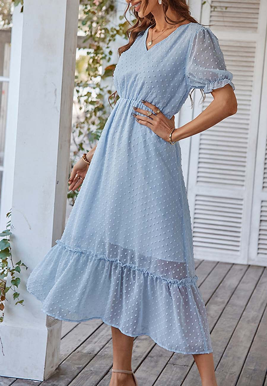 Vestido con dobladillo con volantes y lunares suizos