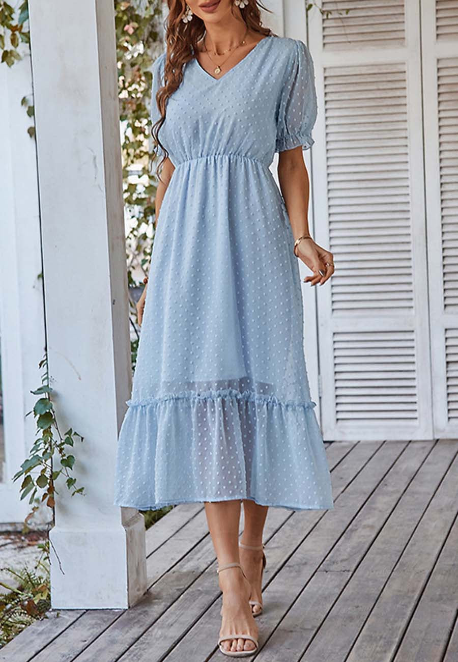Vestido con dobladillo con volantes y lunares suizos