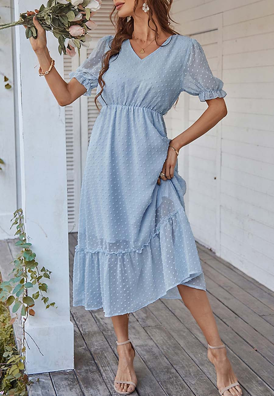 Vestido con dobladillo con volantes y lunares suizos