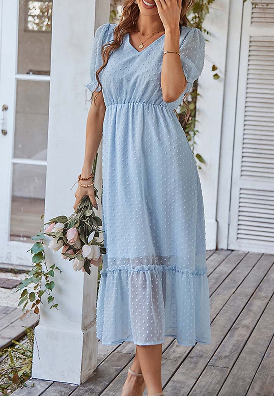 Vestido con dobladillo con volantes y lunares suizos
