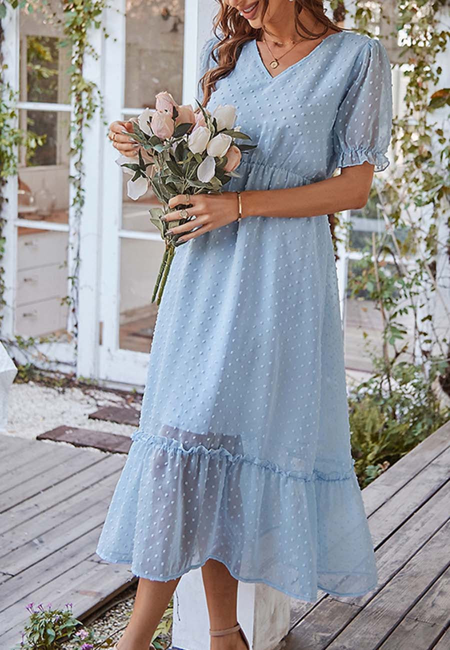 Vestido con dobladillo con volantes y lunares suizos