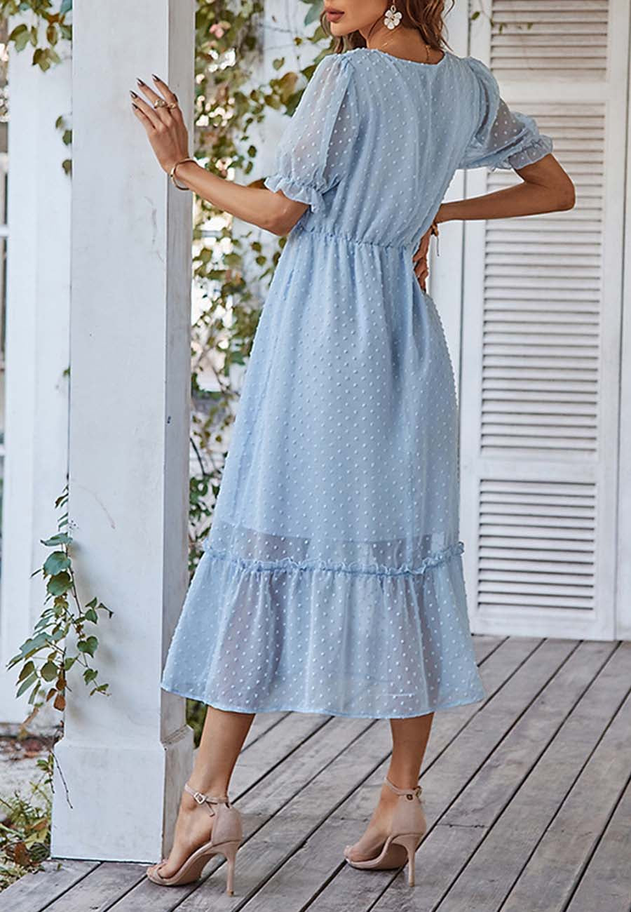 Vestido con dobladillo con volantes y lunares suizos
