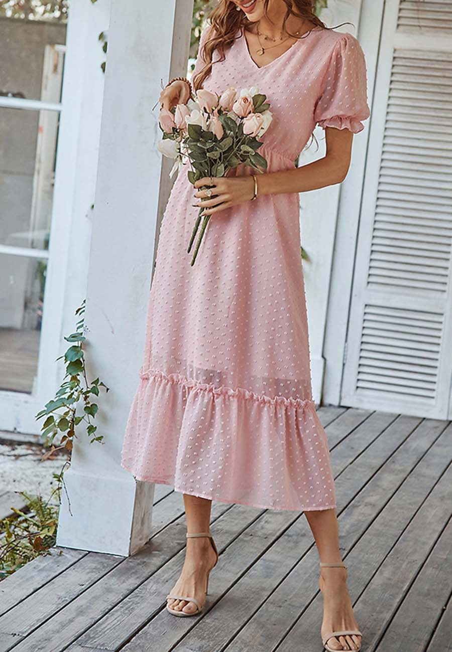 Vestido con dobladillo con volantes y lunares suizos