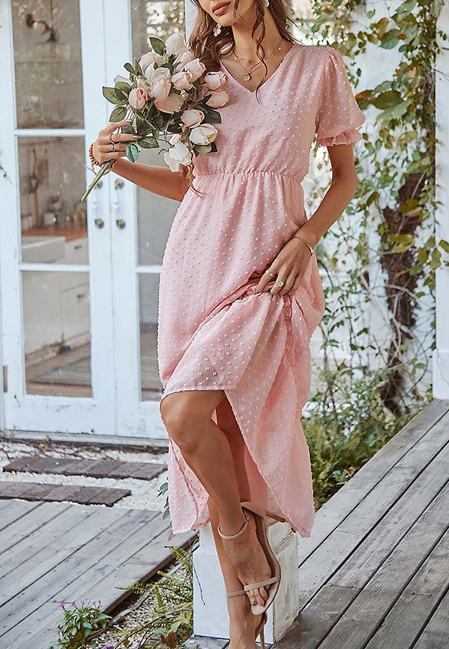 Vestido con dobladillo con volantes y lunares suizos