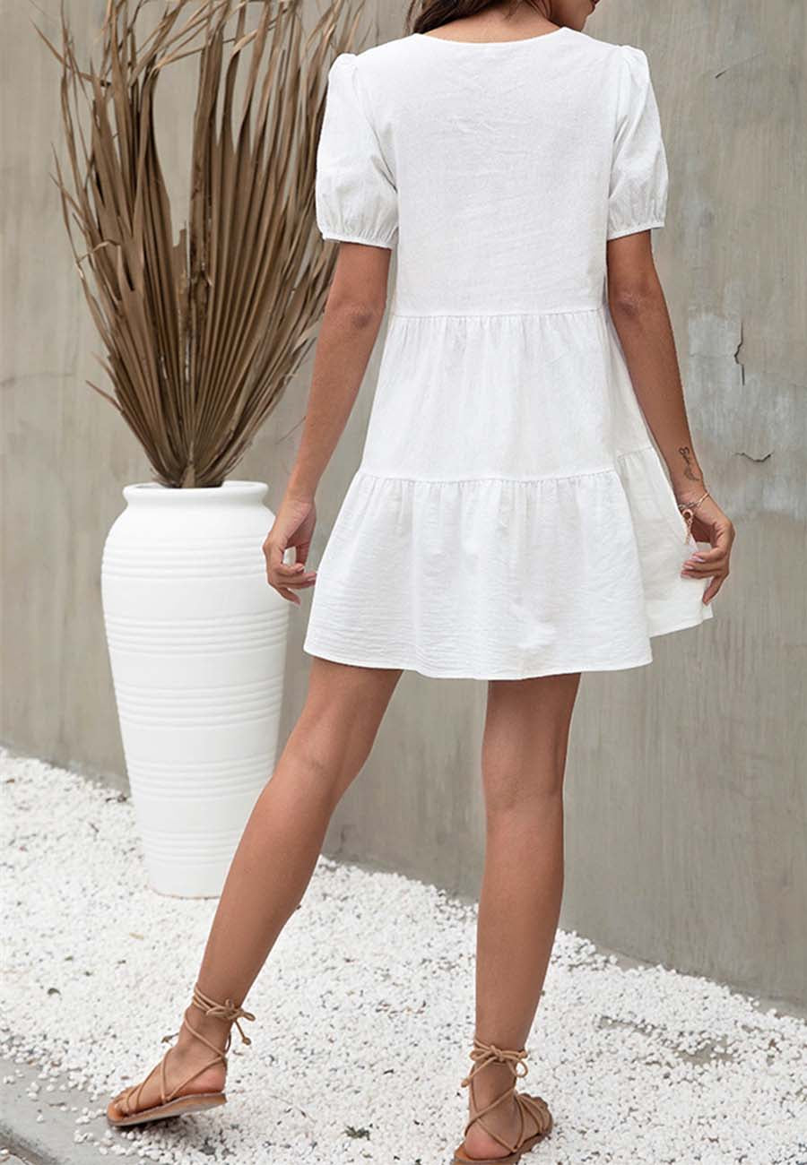 Vestido camisero con mangas abullonadas y escote en V