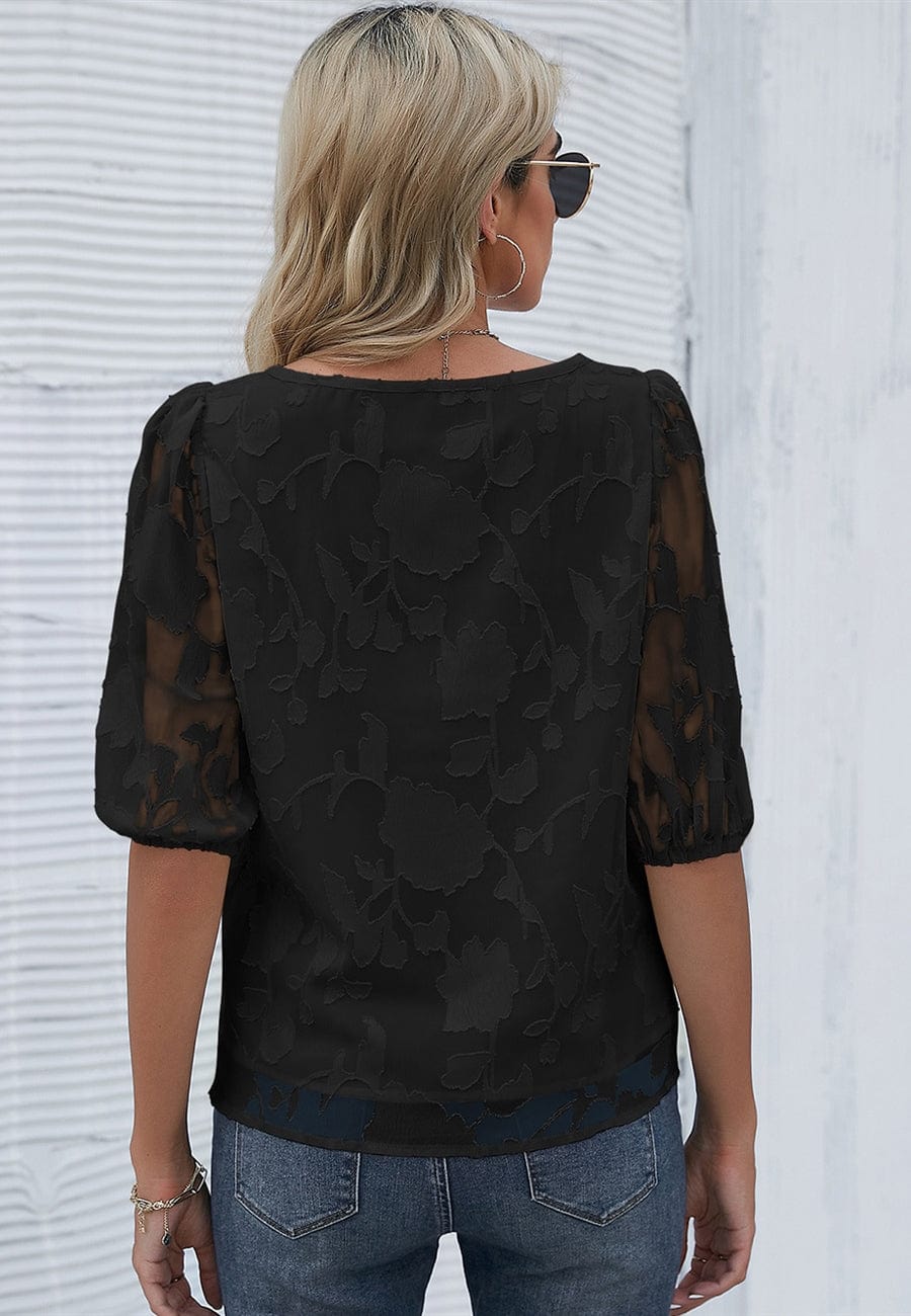 Blusa con mangas abullonadas y estampado floral
