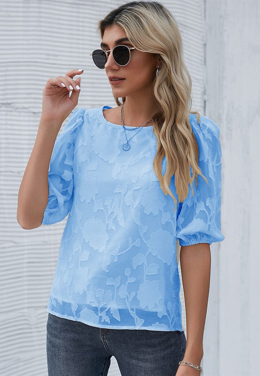 Blusa con mangas abullonadas y estampado floral