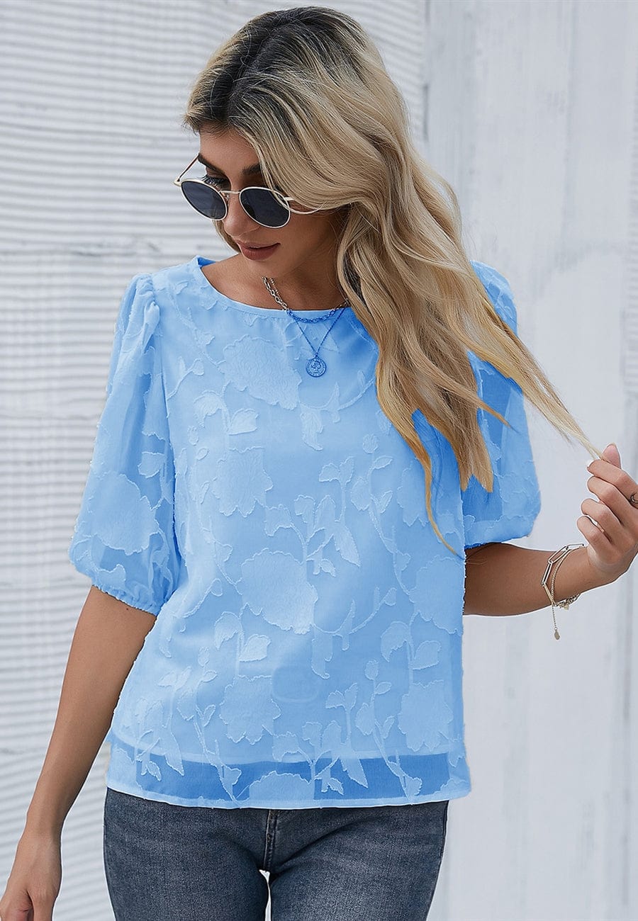 Blusa con mangas abullonadas y estampado floral