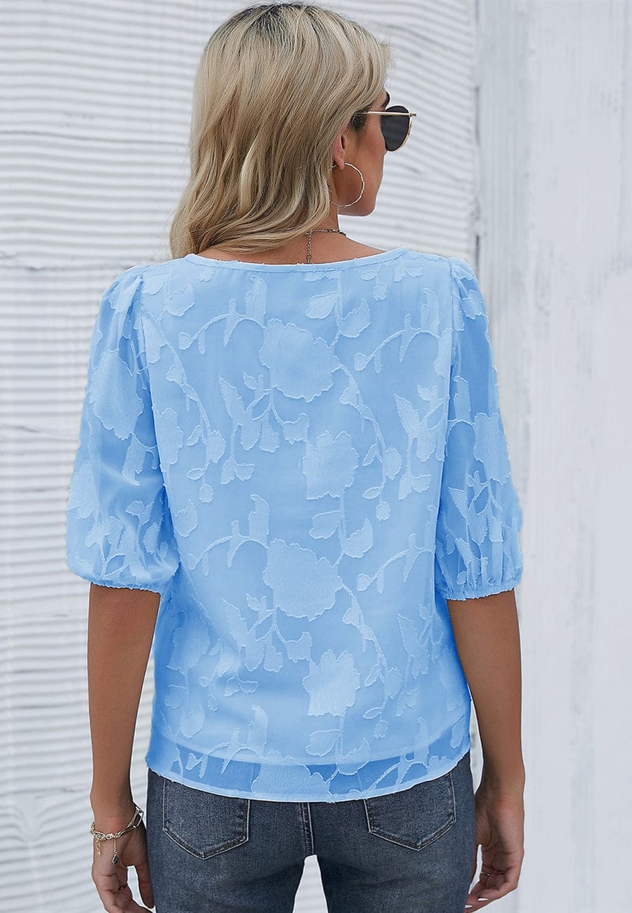 Blusa con mangas abullonadas y estampado floral