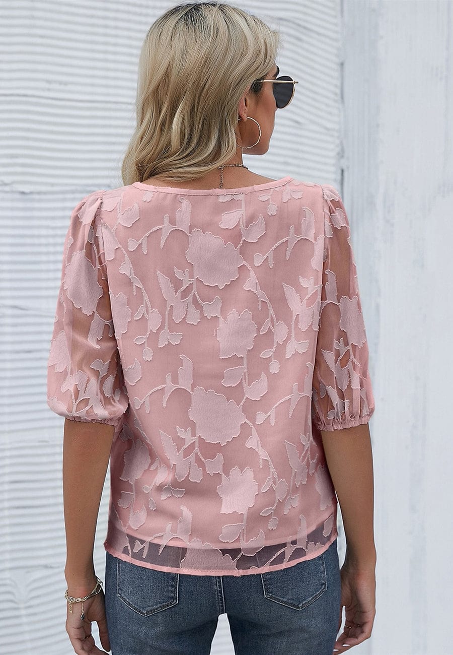 Blusa con mangas abullonadas y estampado floral