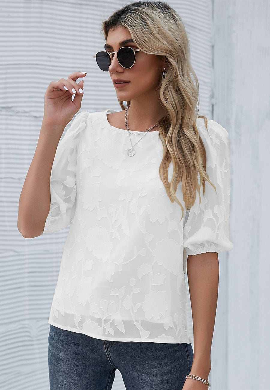 Blusa con mangas abullonadas y estampado floral
