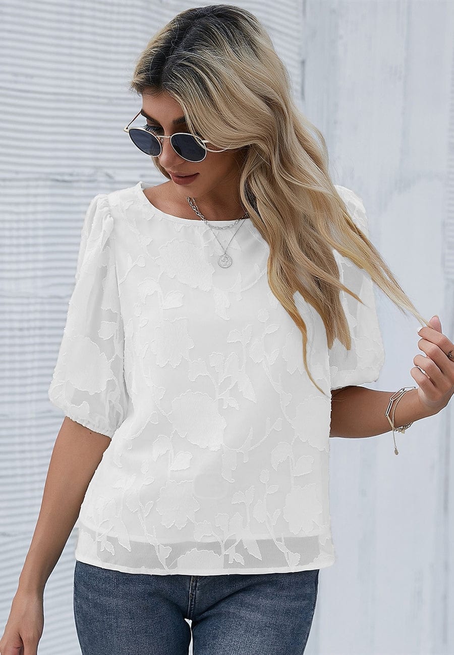 Blusa con mangas abullonadas y estampado floral