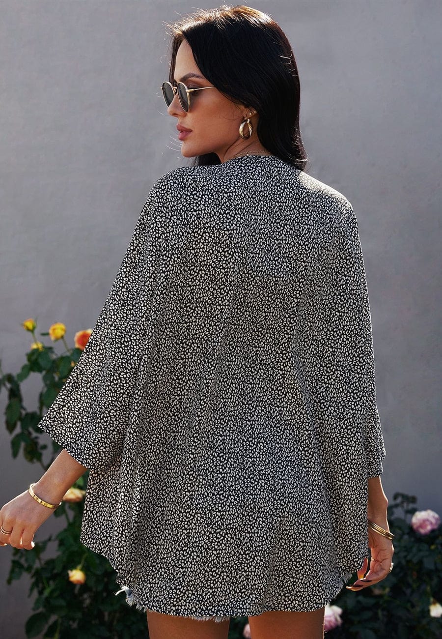 Blusa holgada con estampado animal
