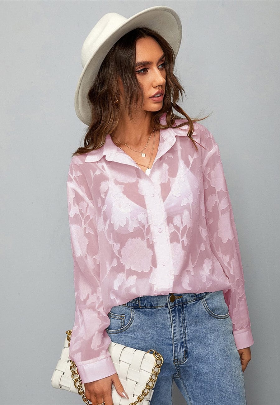 Blusa floral con textura transparente