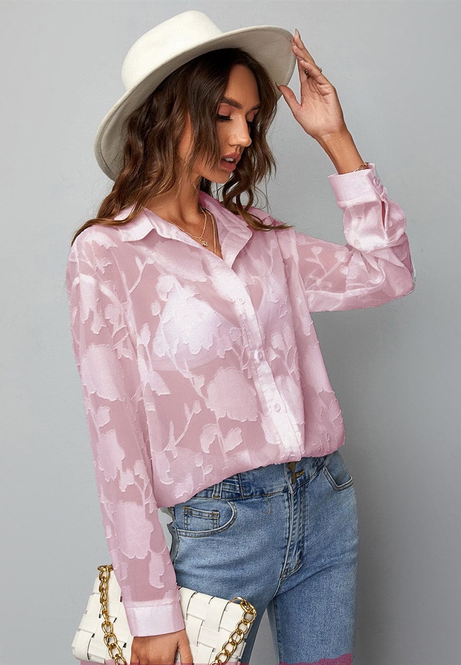 Blusa floral con textura transparente