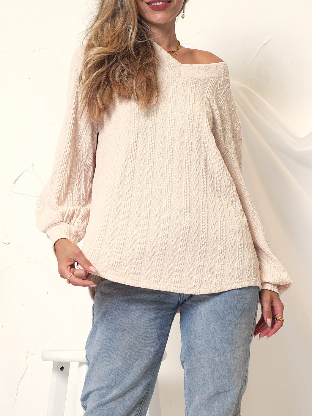 Suéter de cuello en V de punto texturizado