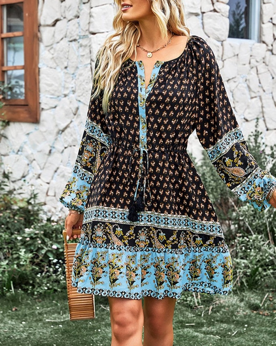 Vestido bohemio con cintura con lazo y borlas