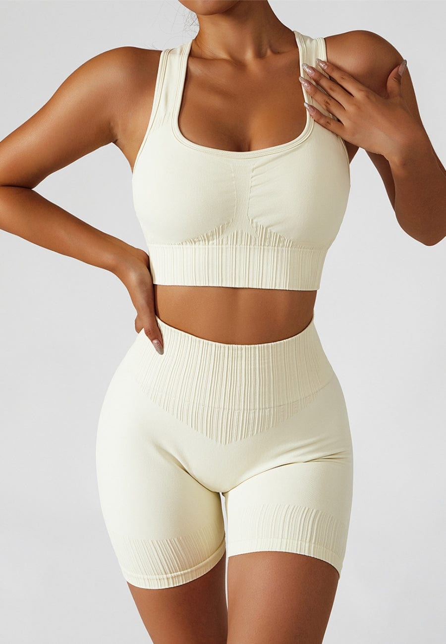 Conjunto de sujetador deportivo con espalda cruzada y pantalones cortos moldeadores de cintura alta