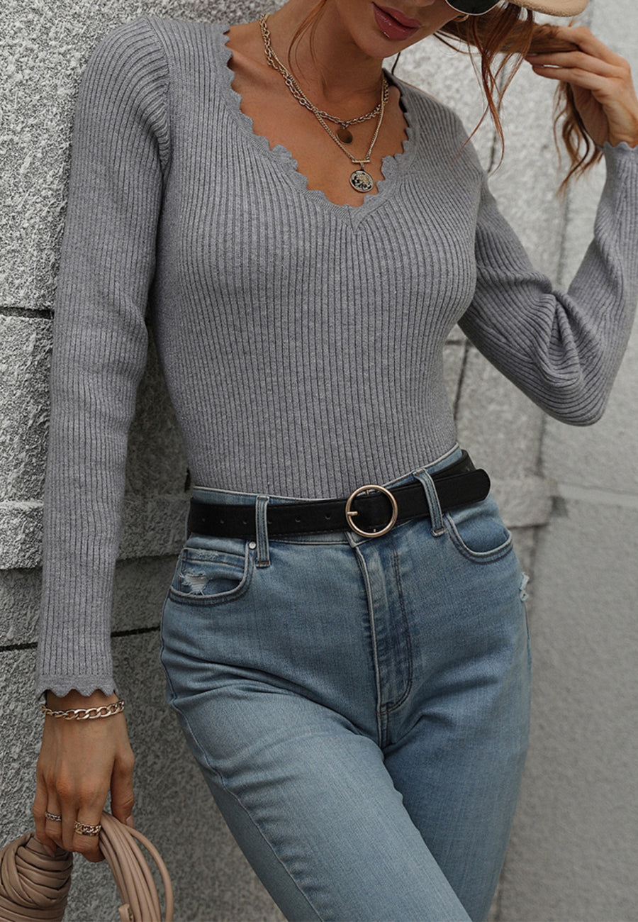 Suéter de punto acanalado con detalle festoneado